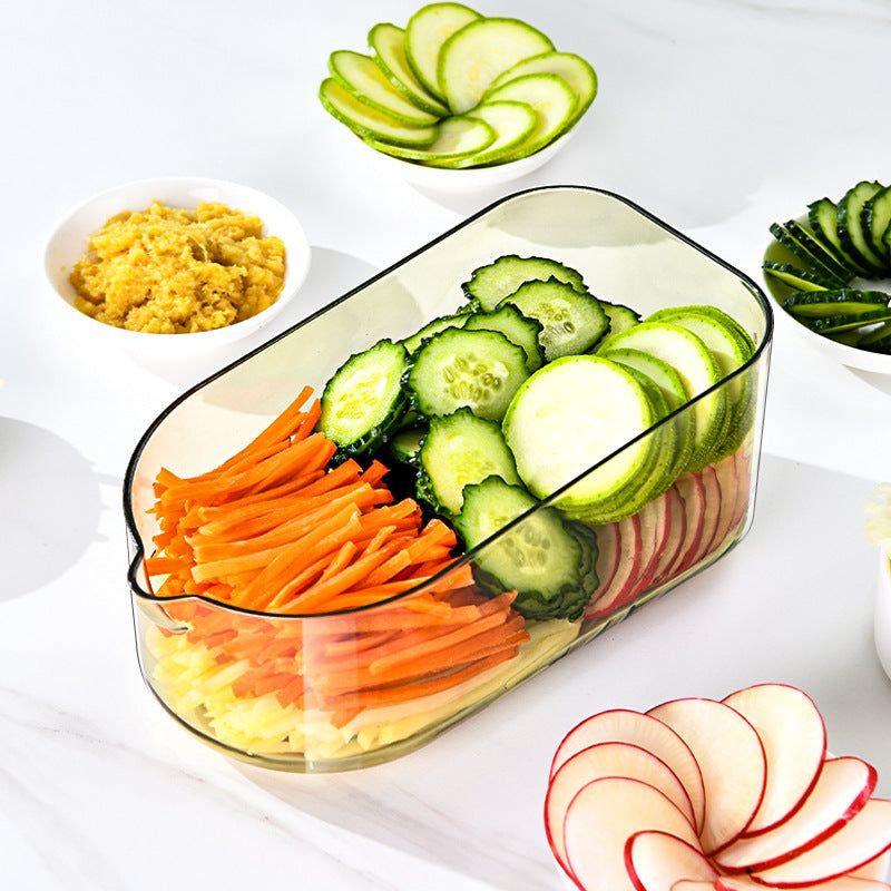 All-in-One Mandoline Slicer prepared fresh thinly sliced cucumbers, carrots, and radishes neatly arranged in a clear rectangular container