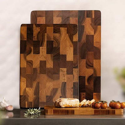 Cutting wood board made from solid acacia mangium wood with a distinctive chessboard grid pattern and rich natural tones