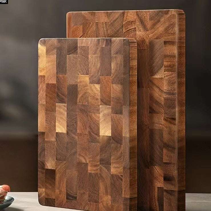 Cutting wood board set made from solid acacia mangium wood featuring a smooth finish and a natural wood grain pattern with varying rectangular blocks