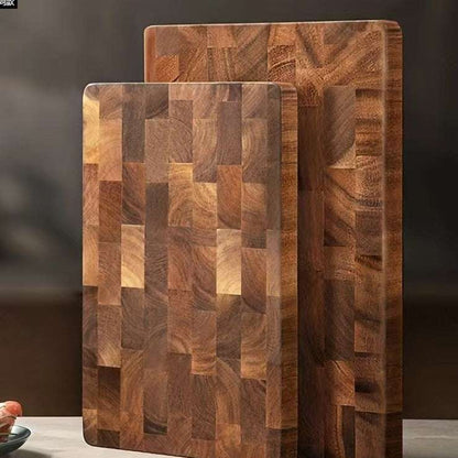 Cutting wood board set made from solid acacia mangium wood featuring a smooth finish and a natural wood grain pattern with varying rectangular blocks