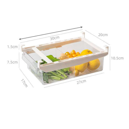 Under-Shelf Pull-Out transparent plastic fridge drawer organizer with white frame, containing vegetables and citrus fruits, with dimensions shown